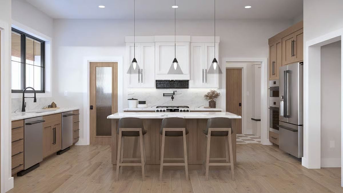 Warm Wood, Marble Island, and Pendant Lights Worth the Splurge
