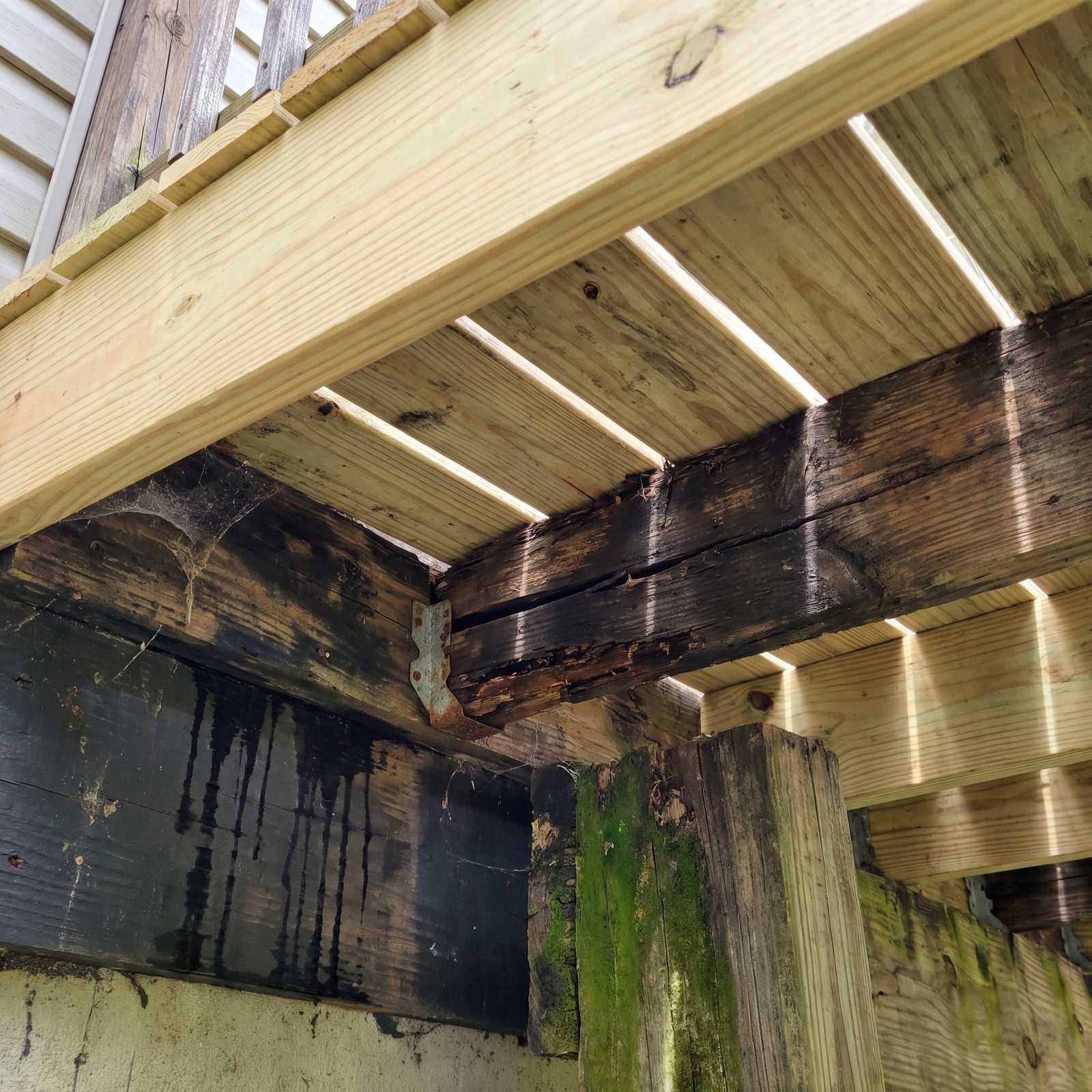 Fresh Deck Boards Over Rotted Joists