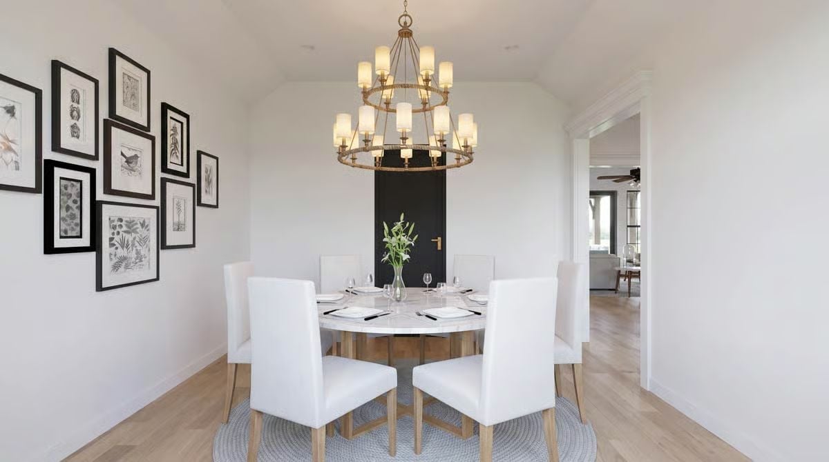 Gold Chandelier, Botanical Prints, and a Round Table That Refuses to Rush Dinner