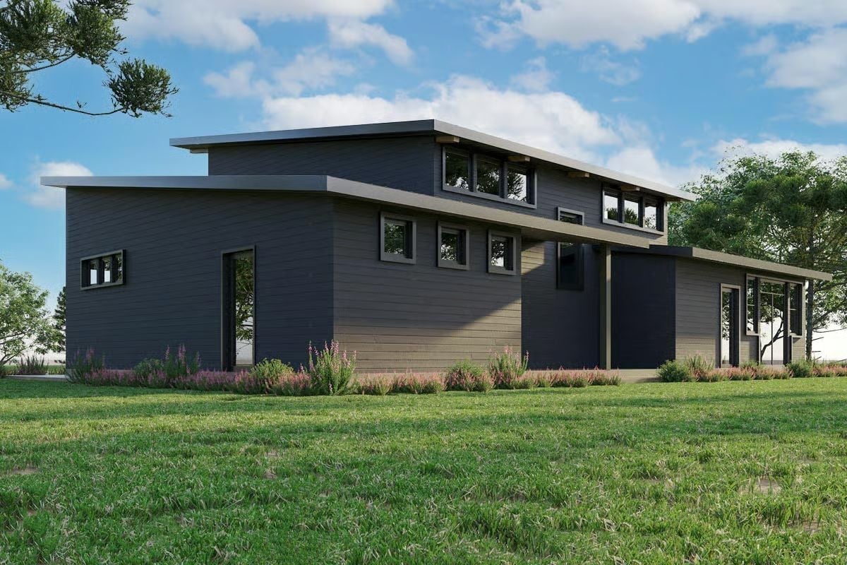 Dark Siding and a Clerestory Band That Pulls in Light Without Sacrificing Privacy