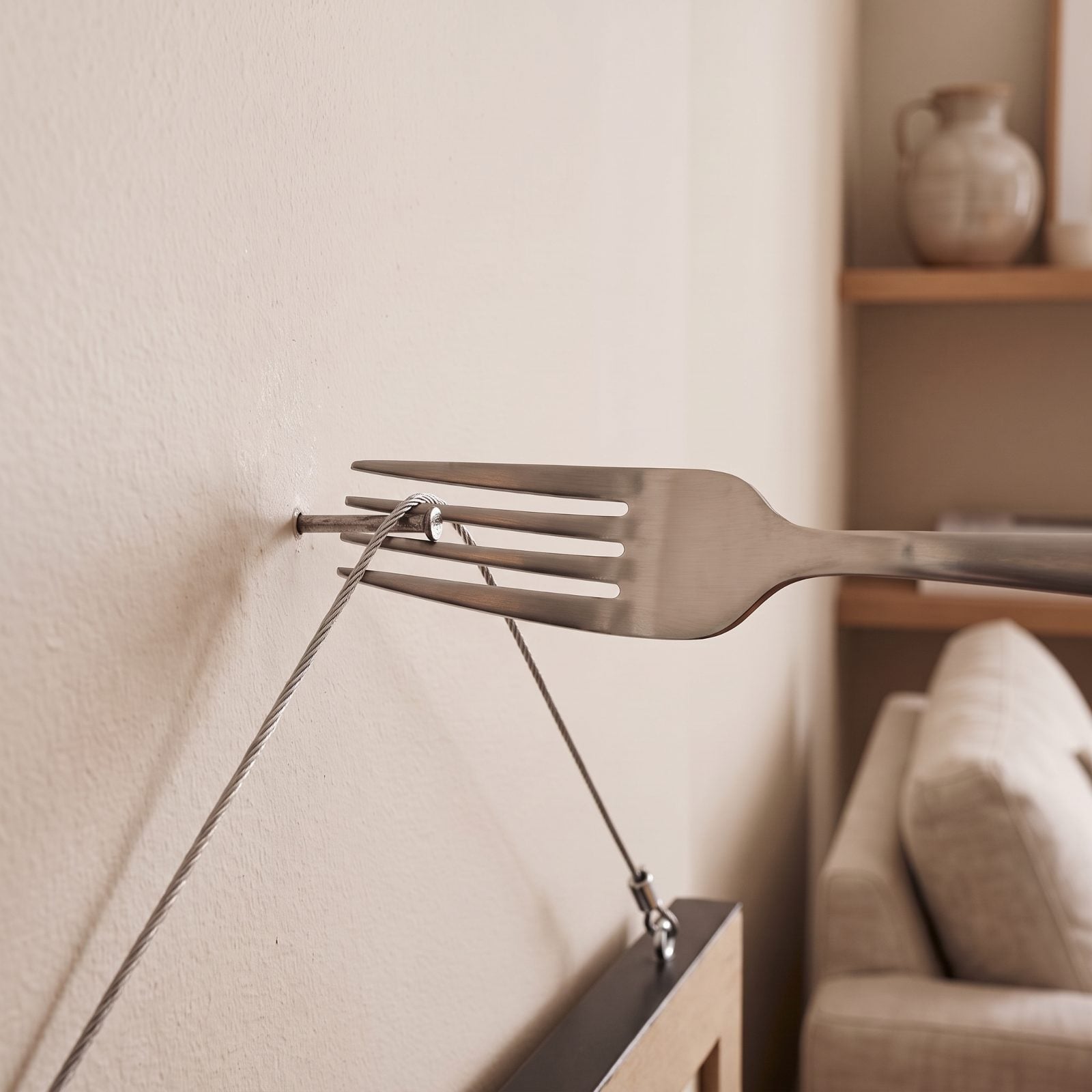 Guide Picture Wire Onto a Nail With a Dinner Fork
