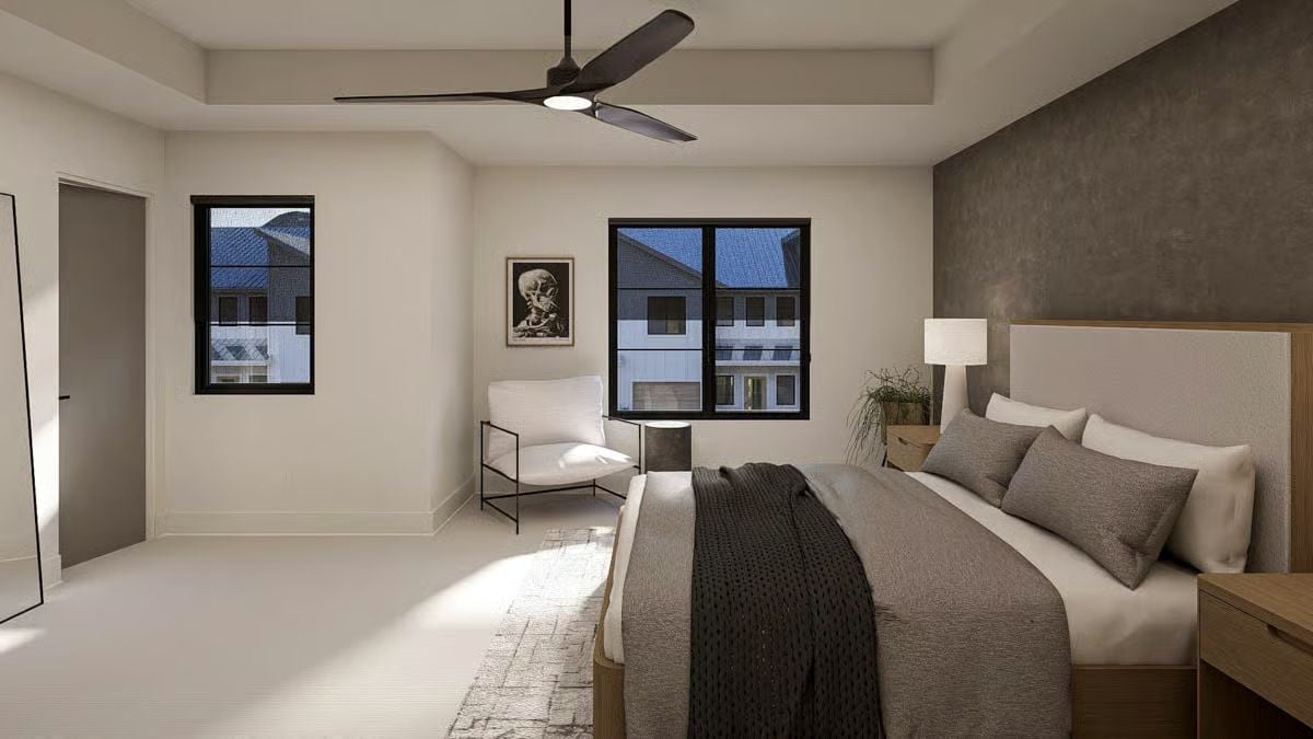 Ceiling Fan, Concrete Accent Wall, and a Bed You Won't Want to Leave