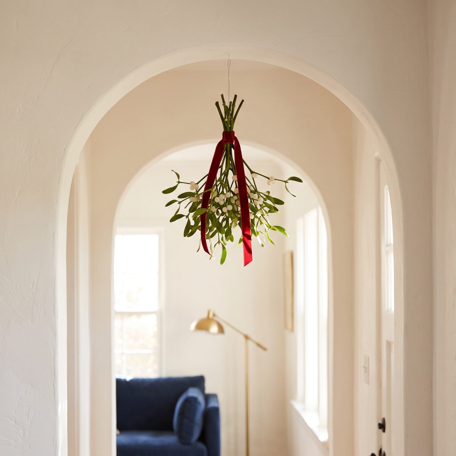 Hang Mistletoe From an Unexpected Interior Arch