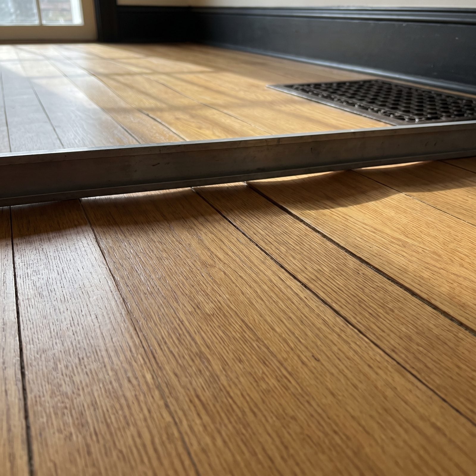 Hardwood Boards Cupping at Their Edges