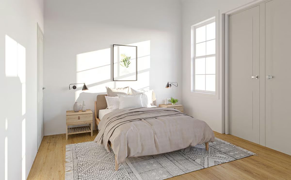 Sunlit Neutral Bedroom Where Linen Bedding and Raw Wood Do All the Talking