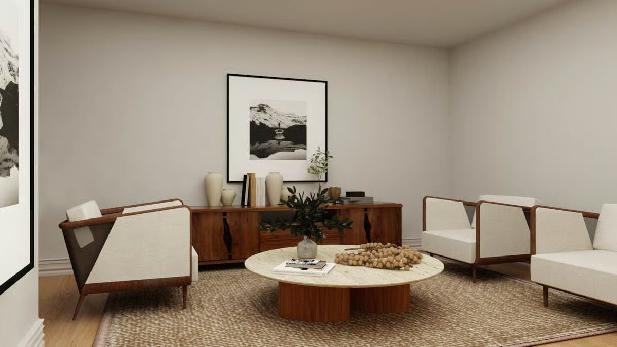 Warm Wood Frames and a Travertine Table That Pull the Whole Room Together
