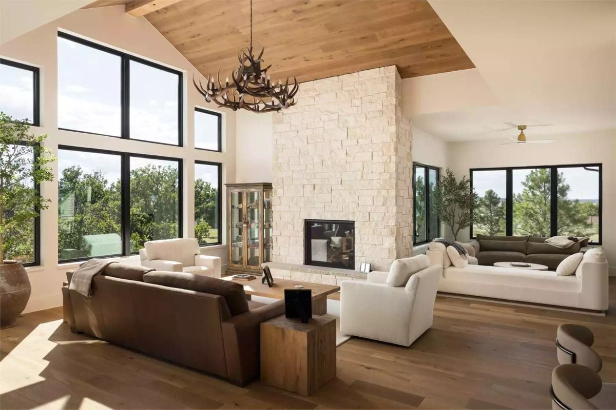 Antler Chandelier Anchors a Great Room Built Around Stone and Natural Light