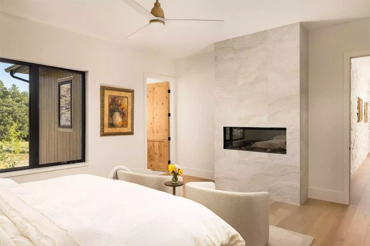 Marble Fireplace Wall Earns Its Place Without Asking for Attention