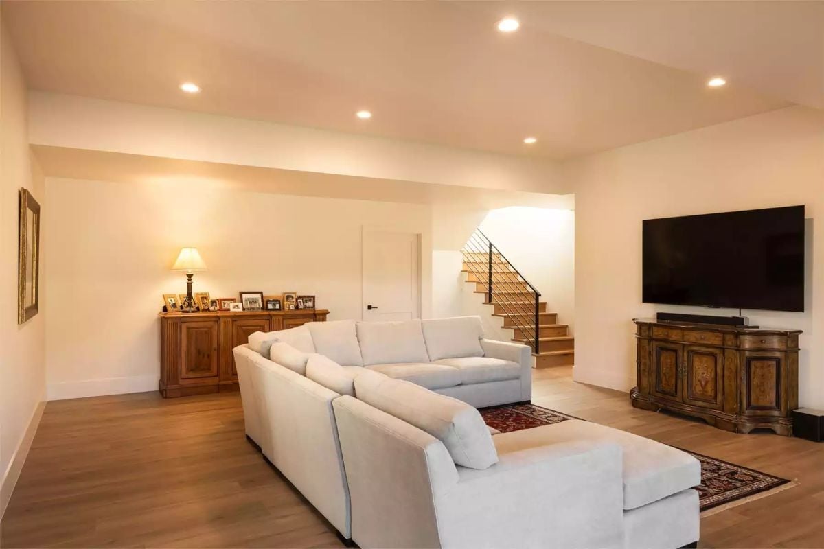 Recessed Lights, a Sectional, and Two Antique Credenzas That Somehow Agree With Each Other