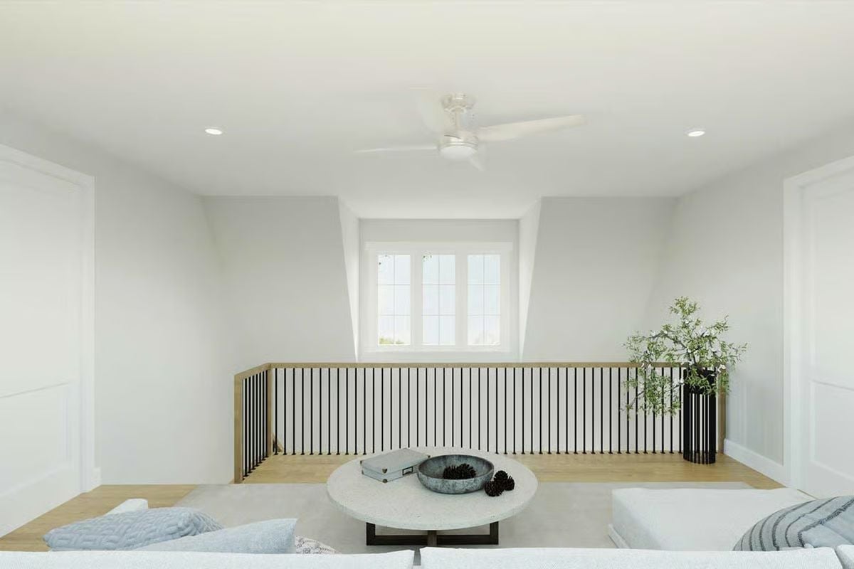 Loft Railings With Wood Caps and Black Spindles Do the Heavy Lifting Here