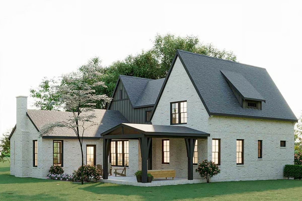 Whitewashed Brick and Dark Trim Give This Rear Elevation Its Character