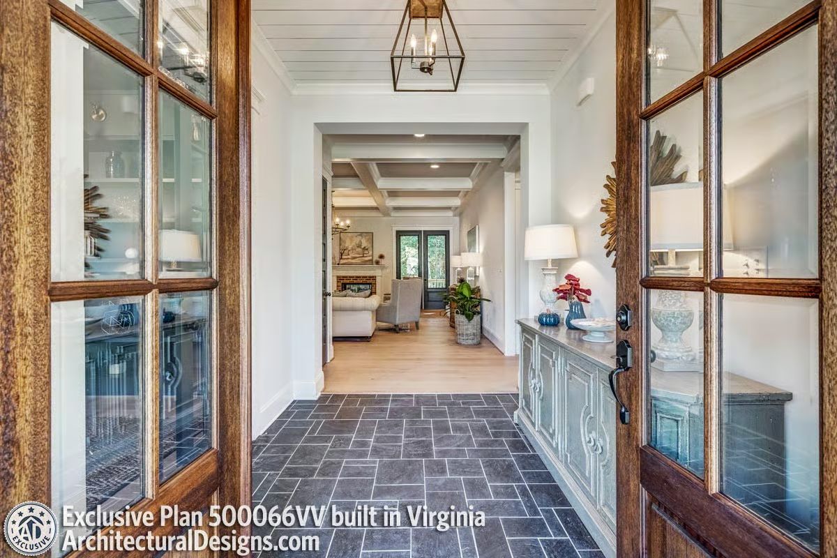 French Doors, Dark Tile, and a Console That Earns Its Place