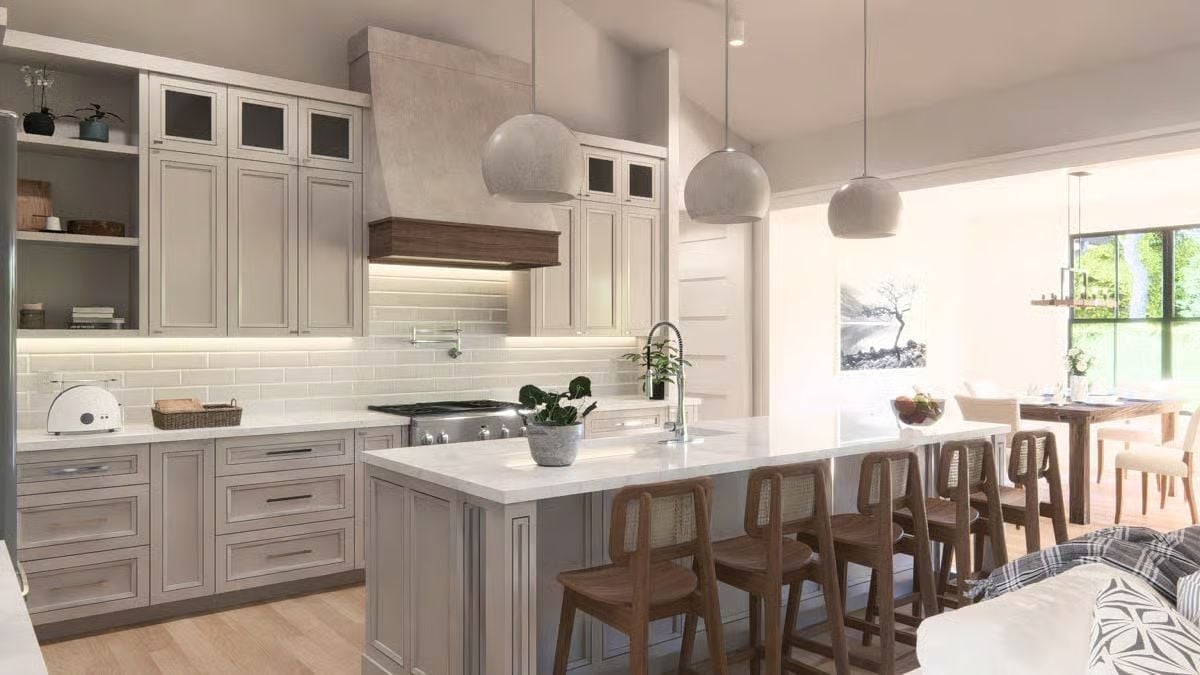 Greige Cabinets and a Concrete Hood That Anchor the Whole Kitchen