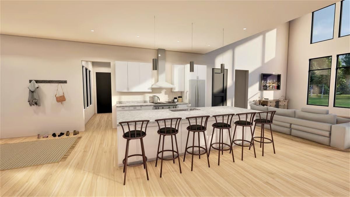 Six Bar Stools Around a Waterfall Island Says Everything About How This Kitchen Was Built