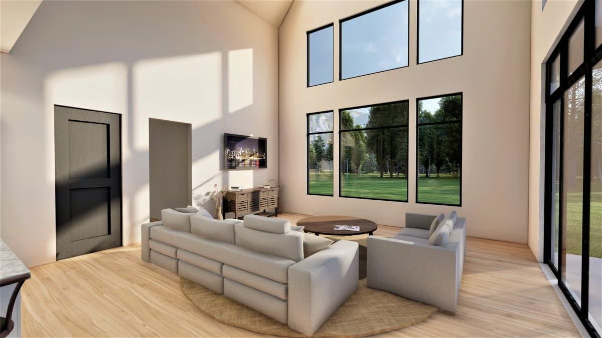 Soaring Ceilings and Black-Frame Windows Do Most of the Work Here