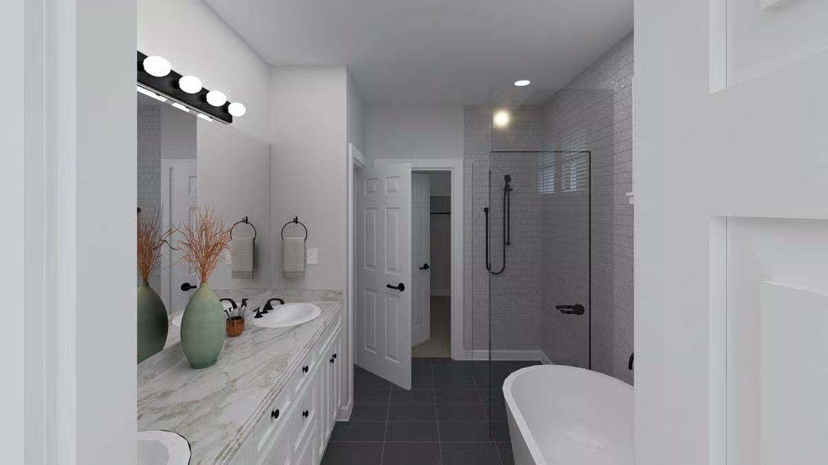 Matte Black Fixtures Against Gray Tile Make a Quiet Argument for Contrast