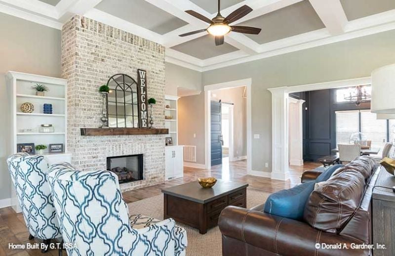 Whitewashed Brick and a Wood Mantel Shelf That Earns Every Inch of Wall Space