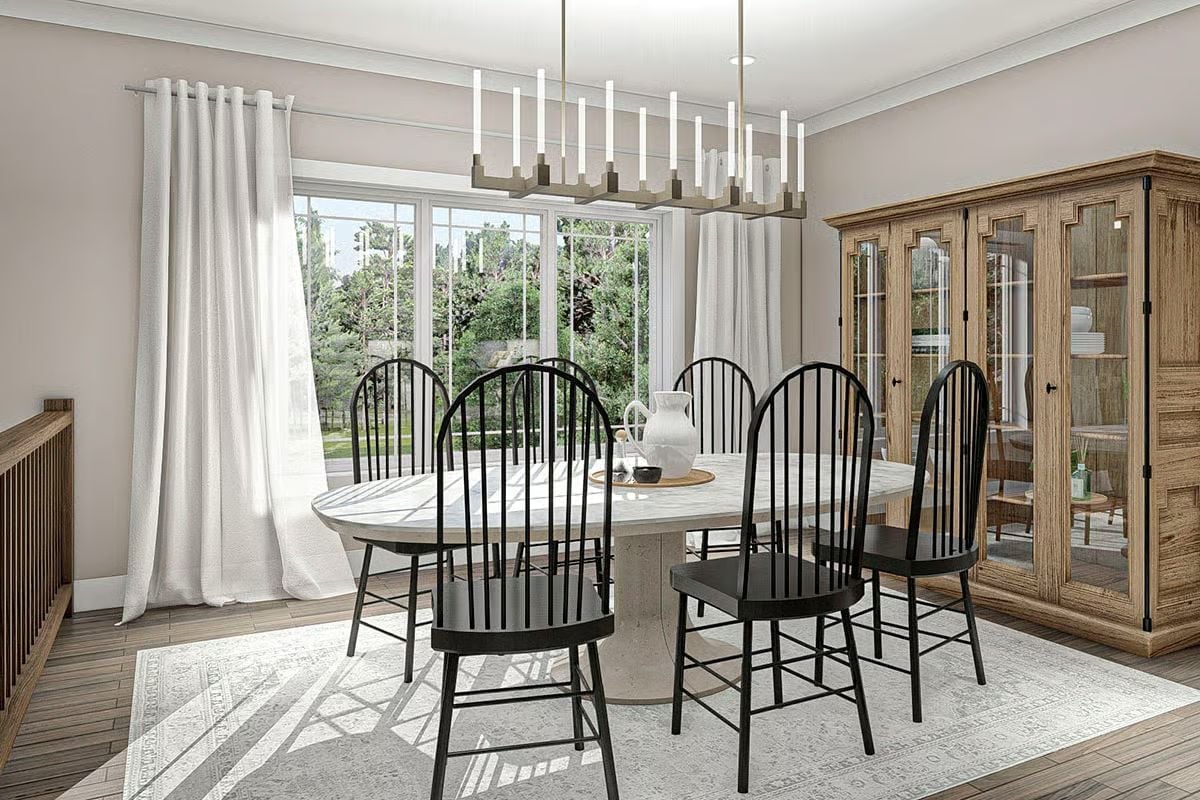 Black Windsor Chairs Were the Right Call Against That Marble Oval