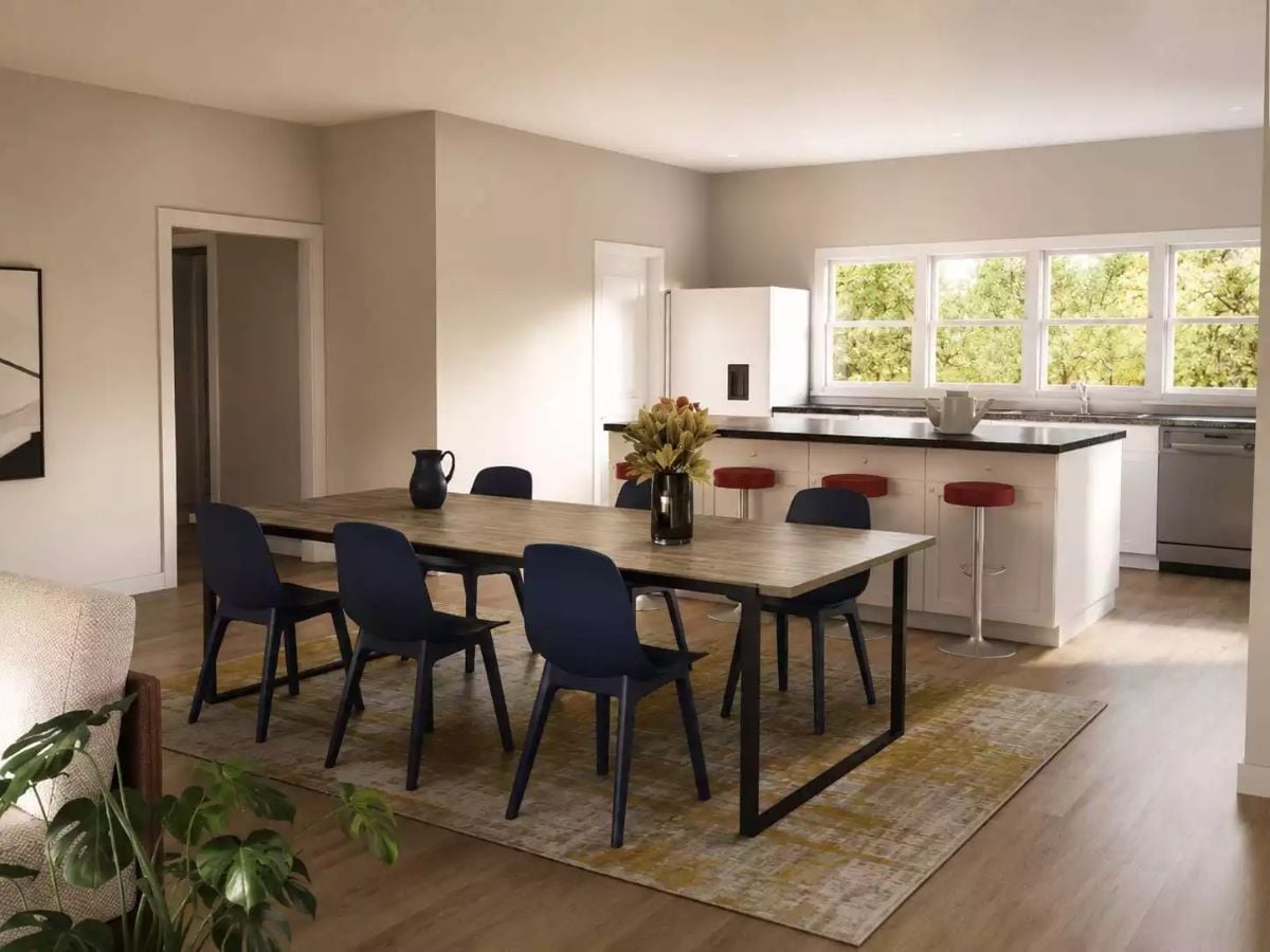 Navy Chairs, Red Barstools, and a Kitchen That Doesn't Hide from the Party