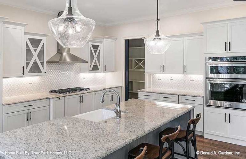 Seeded Glass Pendants and a Sink That Belongs to the Island