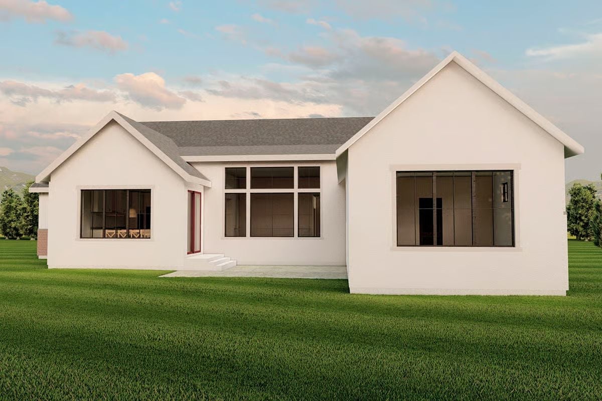 Crisp White Stucco and Oversized Windows Pull Every Room Toward the Backyard