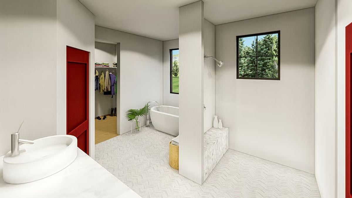 Freestanding Tub, Herringbone Tile, and a Walk-In Closet Hiding in Plain Sight