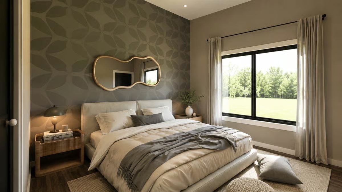 Wavy Gold Mirror and Botanical Wallpaper Pull This Bedroom Away From Safe