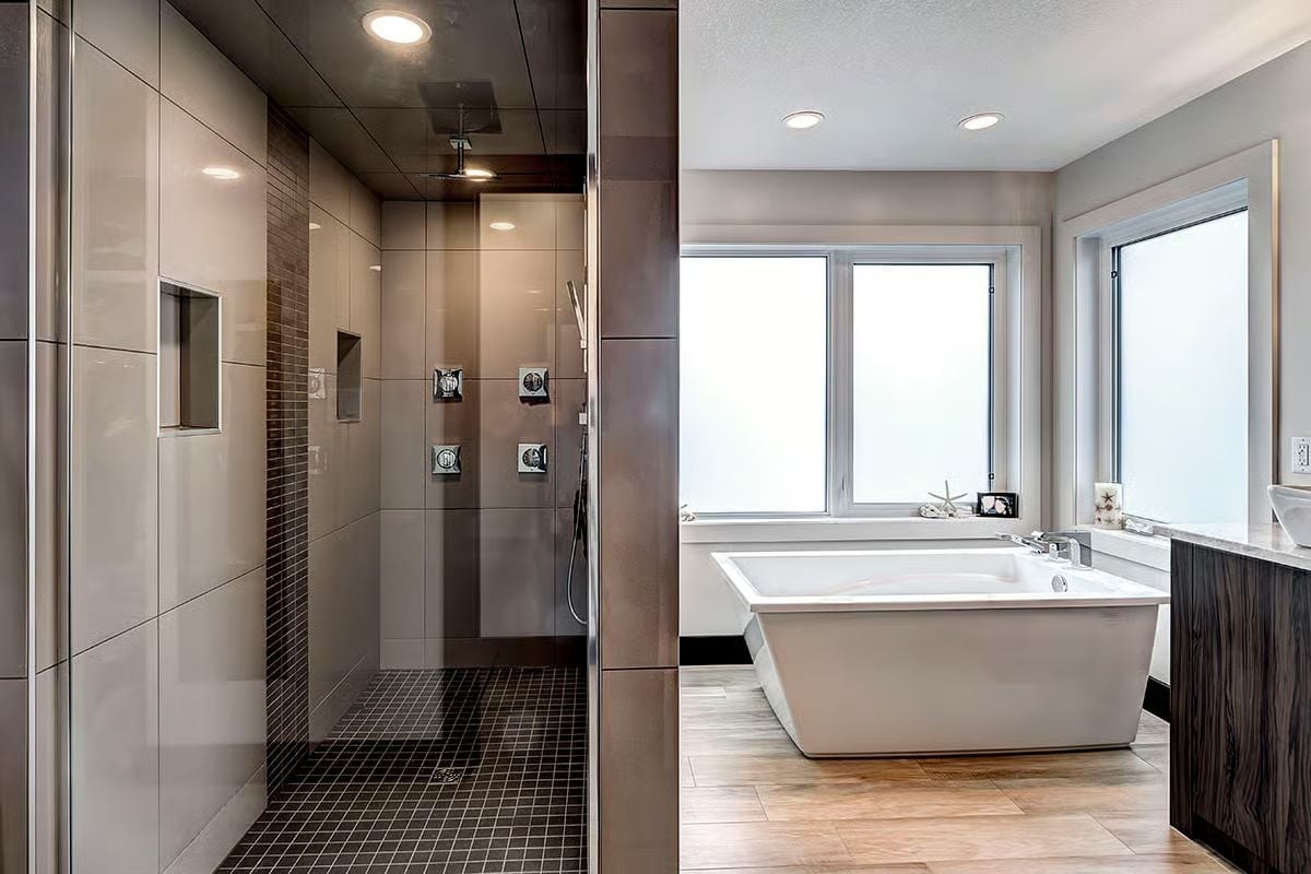Dual Shower Controls, a Soaking Tub, and Frosted Glass That Keeps the Light