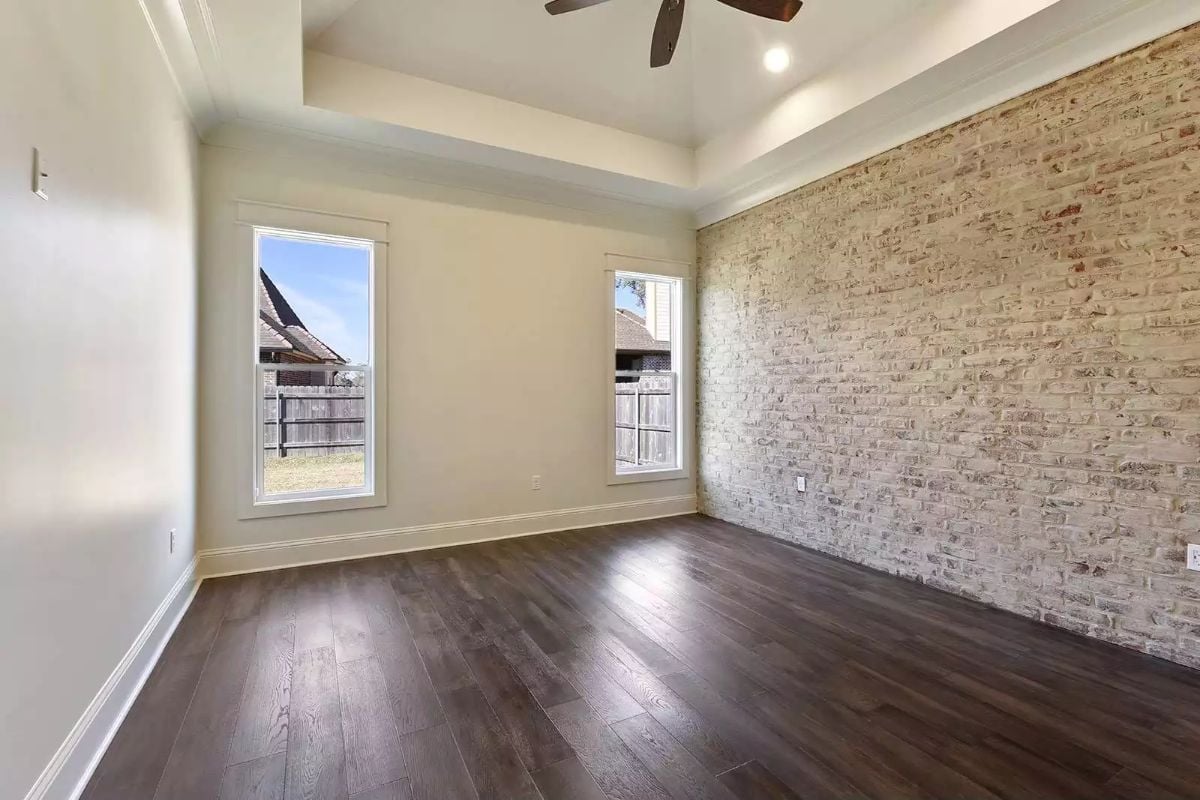 Whitewashed Brick Accent Wall That Earns Every Square Foot It Takes Up