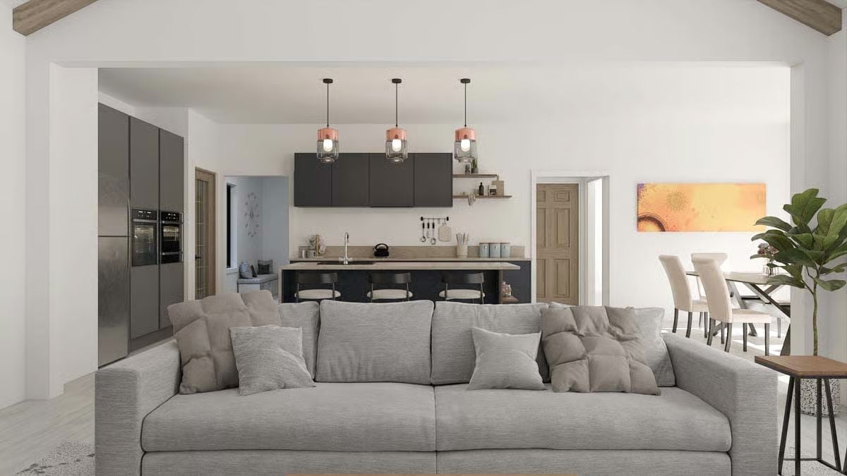 Gray Sofa, Copper Pendants, and a Kitchen That Doesn't Hide in the Back