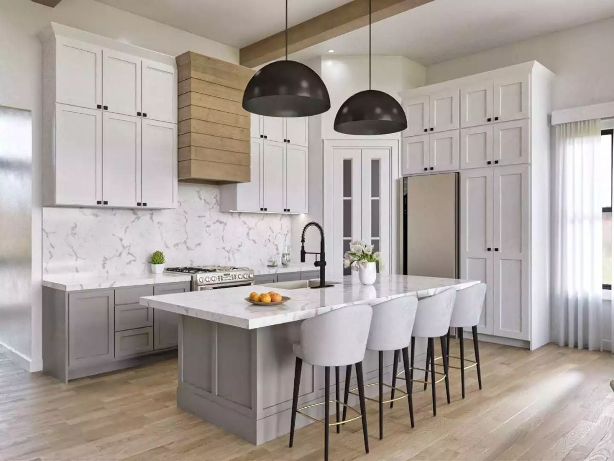 Gray Lower Cabinets and a Wood Range Hood Keep This Kitchen Grounded