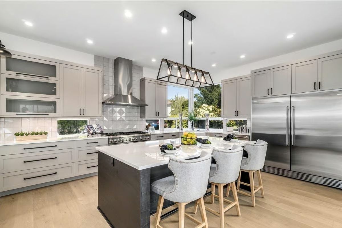 Quartz Island, Gray Shaker Cabinets, and a Statement Pendant That Earns Its Spot