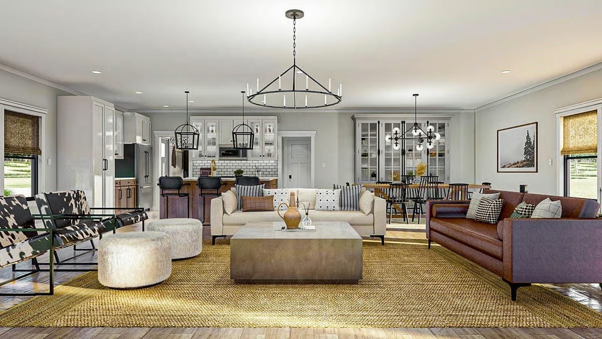 Cow-Hide Chairs, Leather Sofas, and a Rug That Anchors the Whole Room
