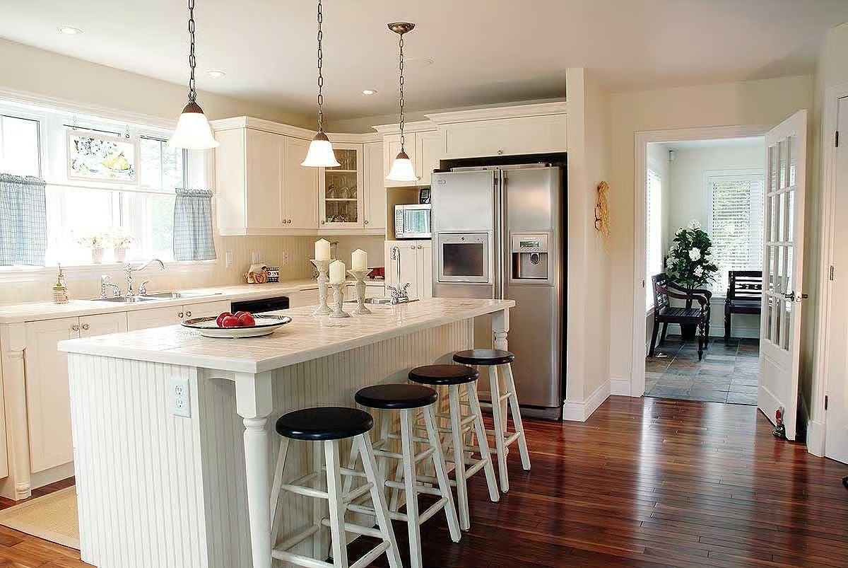 Pendant Lights, Marble Tile, and Four Stools That Say "Sit Down, Stay Awhile"