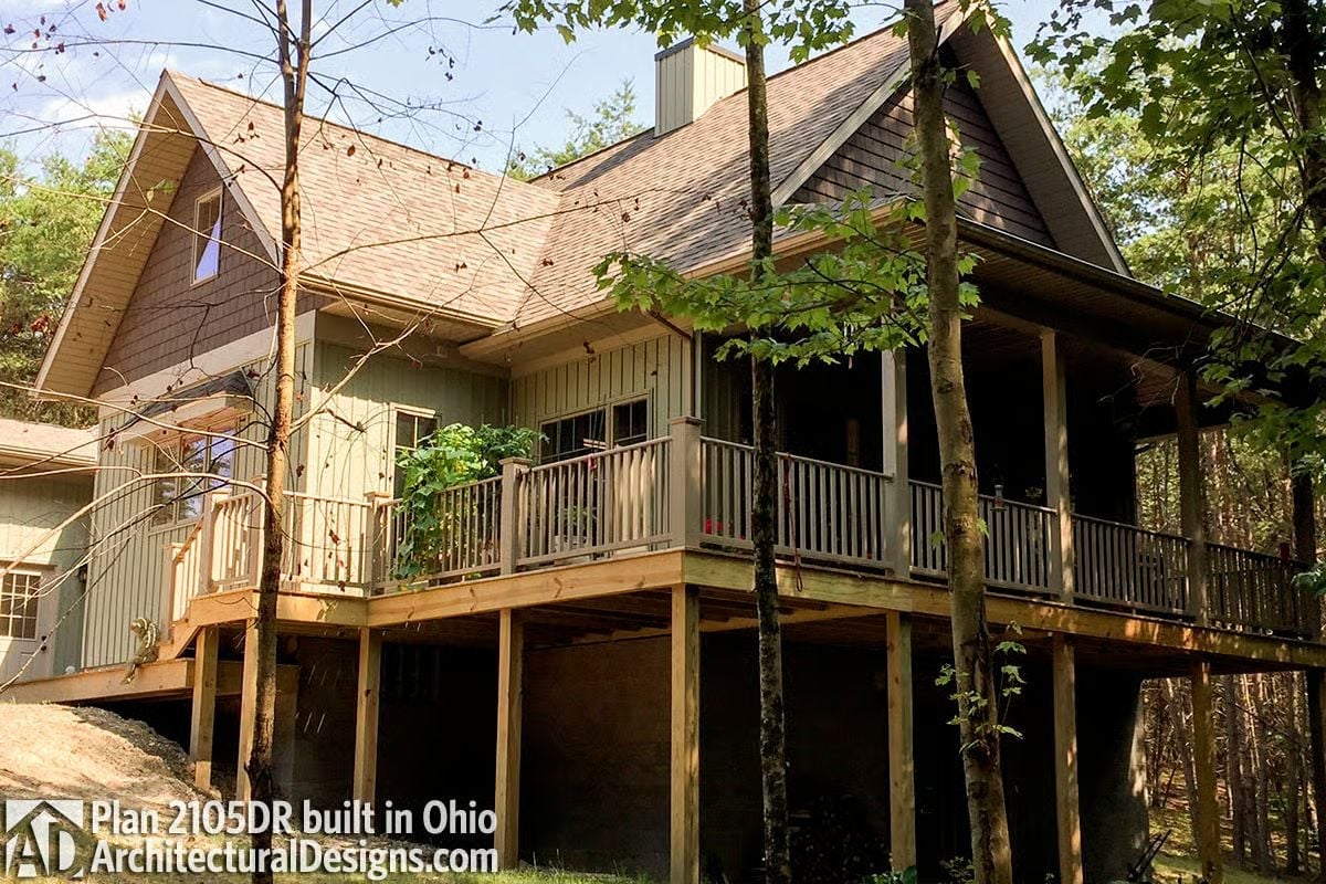 Raised Deck and Screened Porch Tucked Into the Trees Like It Belongs There