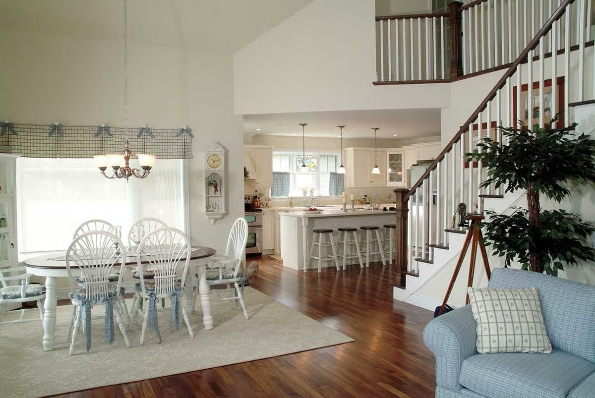 Windsor Chairs, Blue Bows, and a Kitchen That Keeps the Conversation Going