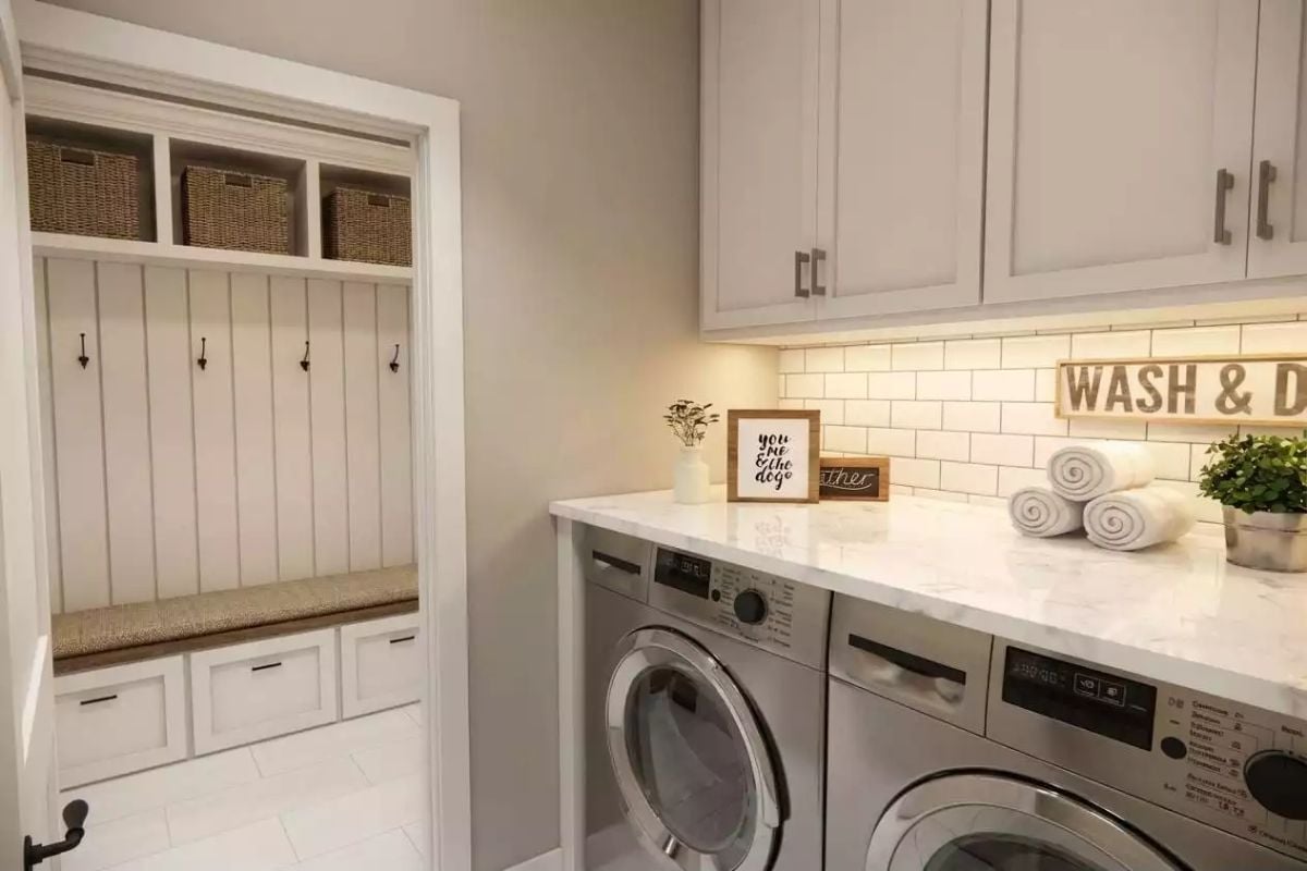 Mudroom Nook and Marble Countertop Make the Laundry Room Pull Double Duty