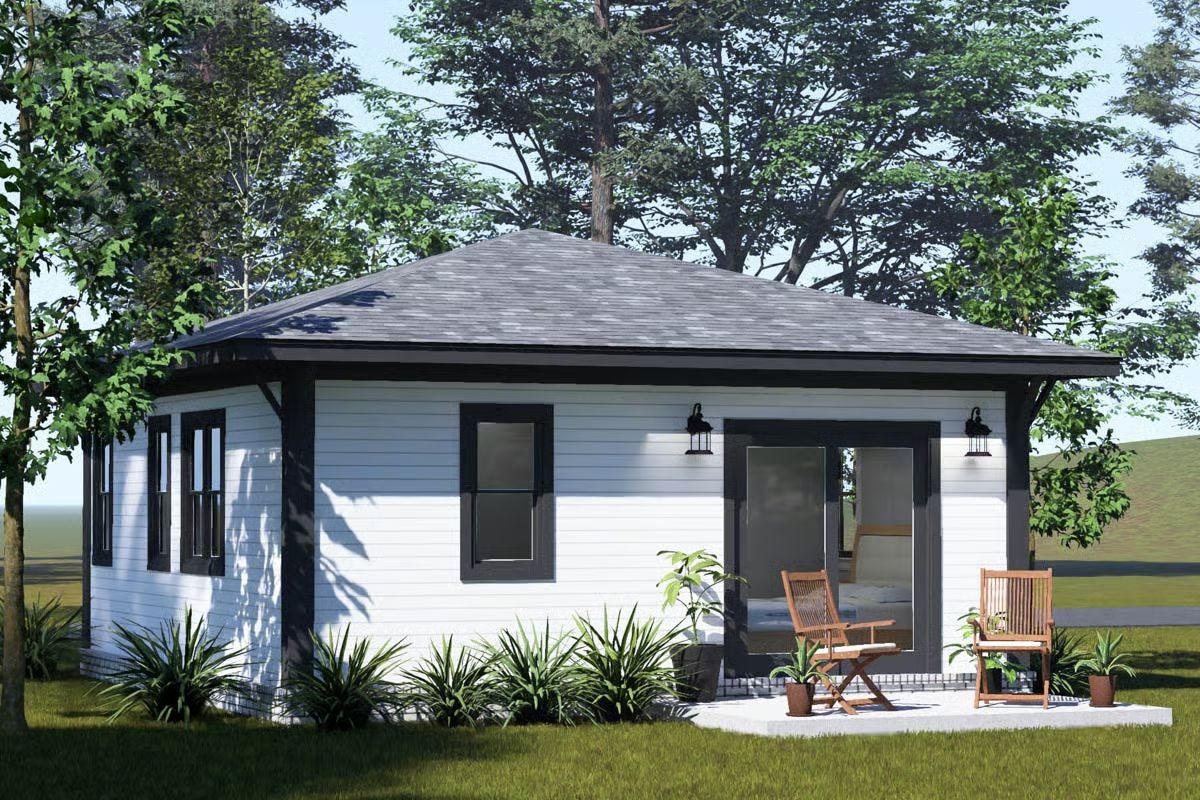 White Siding, Black Trim, and a Patio That Actually Invites You to Sit Down
