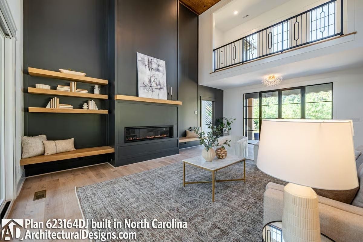 Dark Walls, Warm Shelves, and a Linear Fireplace That Actually Earns Attention