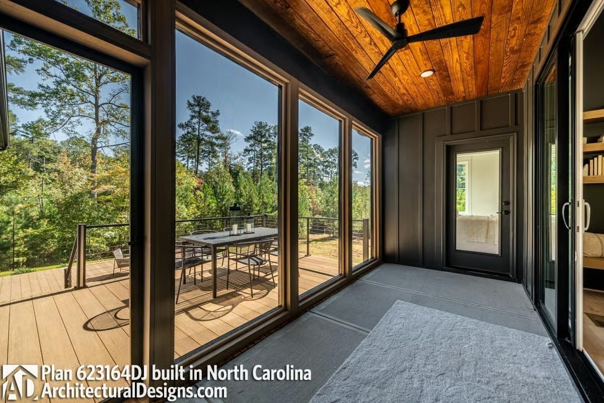 Screened Porch With a Wood Ceiling and Glass Walls That Don't Block Anything