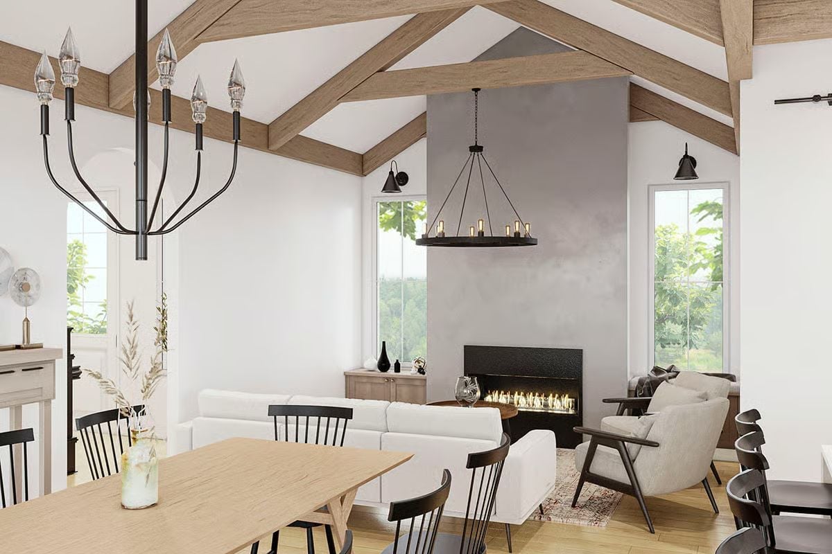 Exposed Timber Trusses Pull Every Sightline Upward in This Open Great Room
