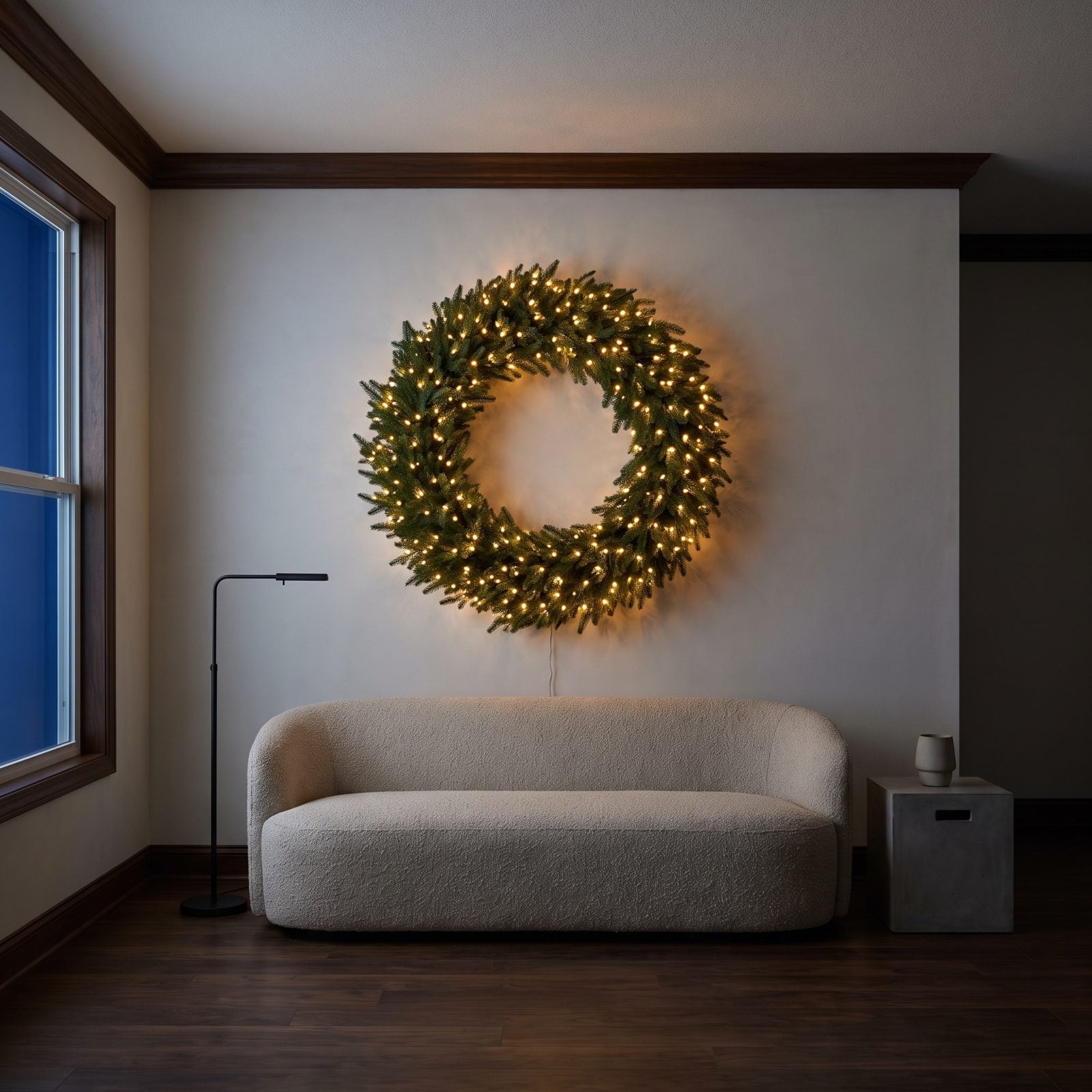 A Minimalist Room with One Oversized Glowing Wreath