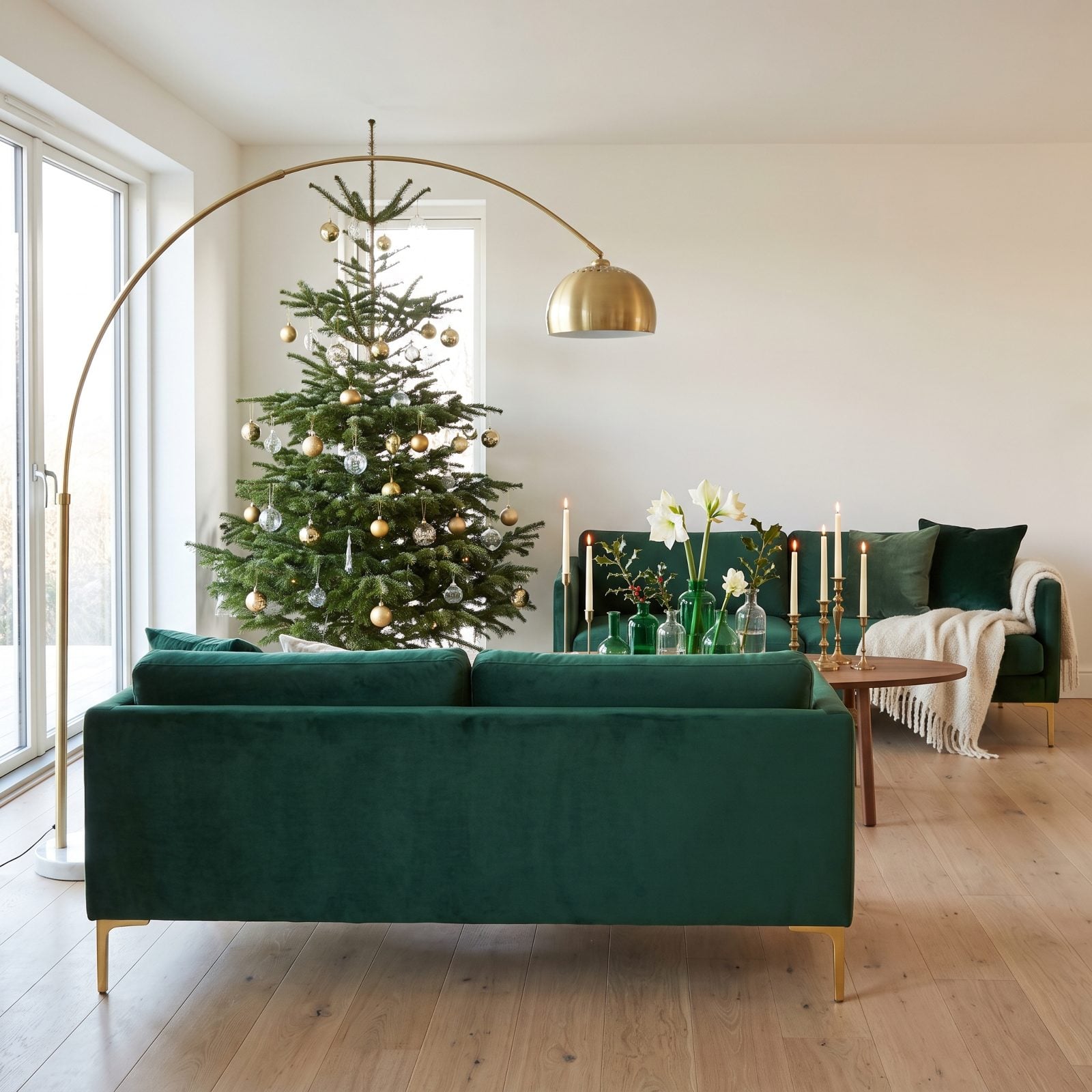 A Modern Living Room Using Emerald Glass and Brass Accents
