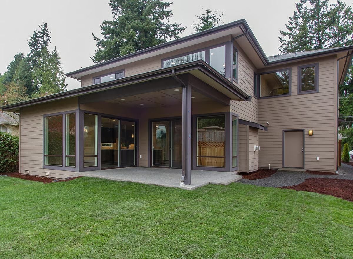 Covered Patio With a Column and Clerestory Glass Does the Work Two Rooms Usually Split
