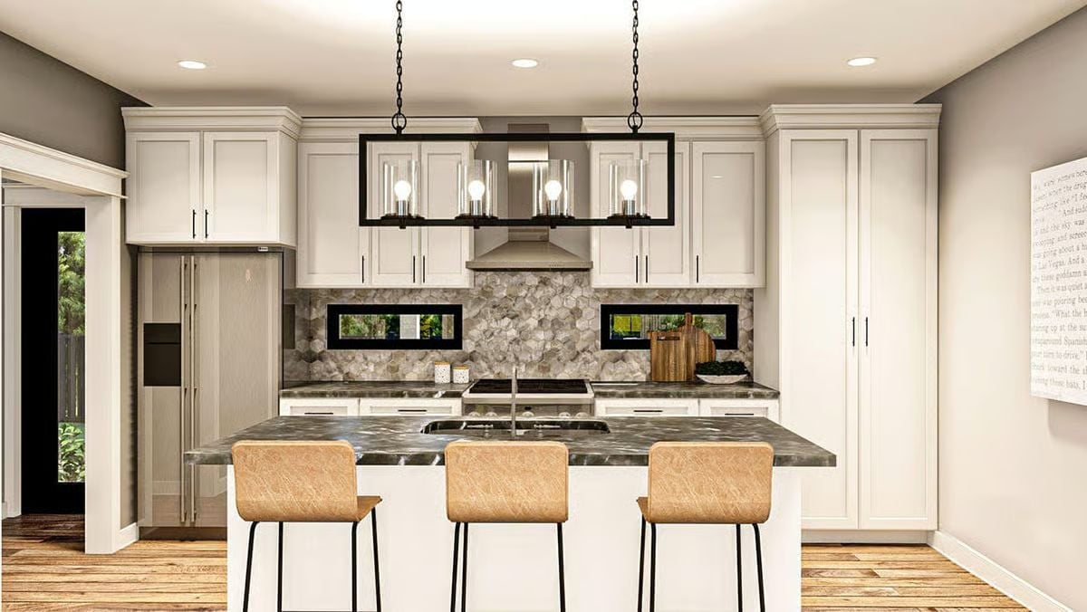 Hexagon Stone Backsplash and Marble Island Make This Kitchen Worth the Upgrade