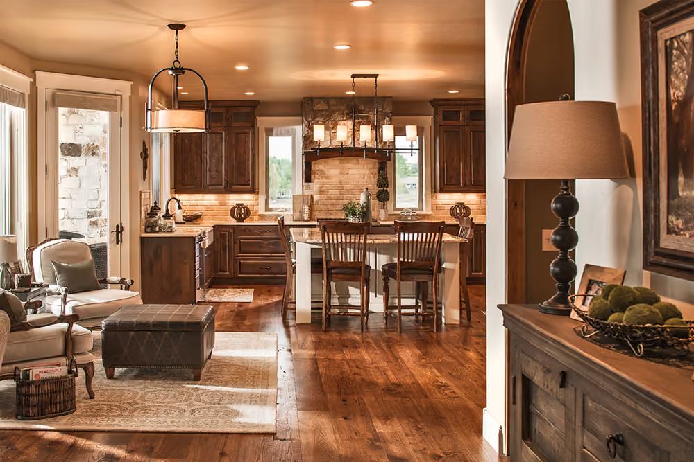 Warm Wood, Stone Hood, and a Kitchen Island Built for Lingering