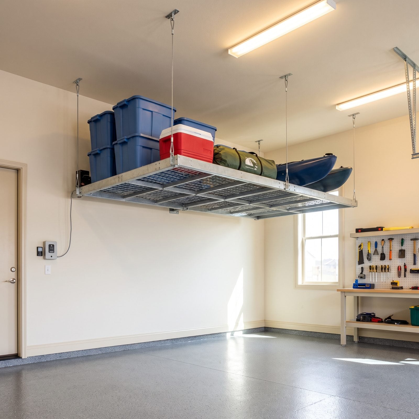 Motorized Ceiling Rack That Lifts Clutter Off Your Car