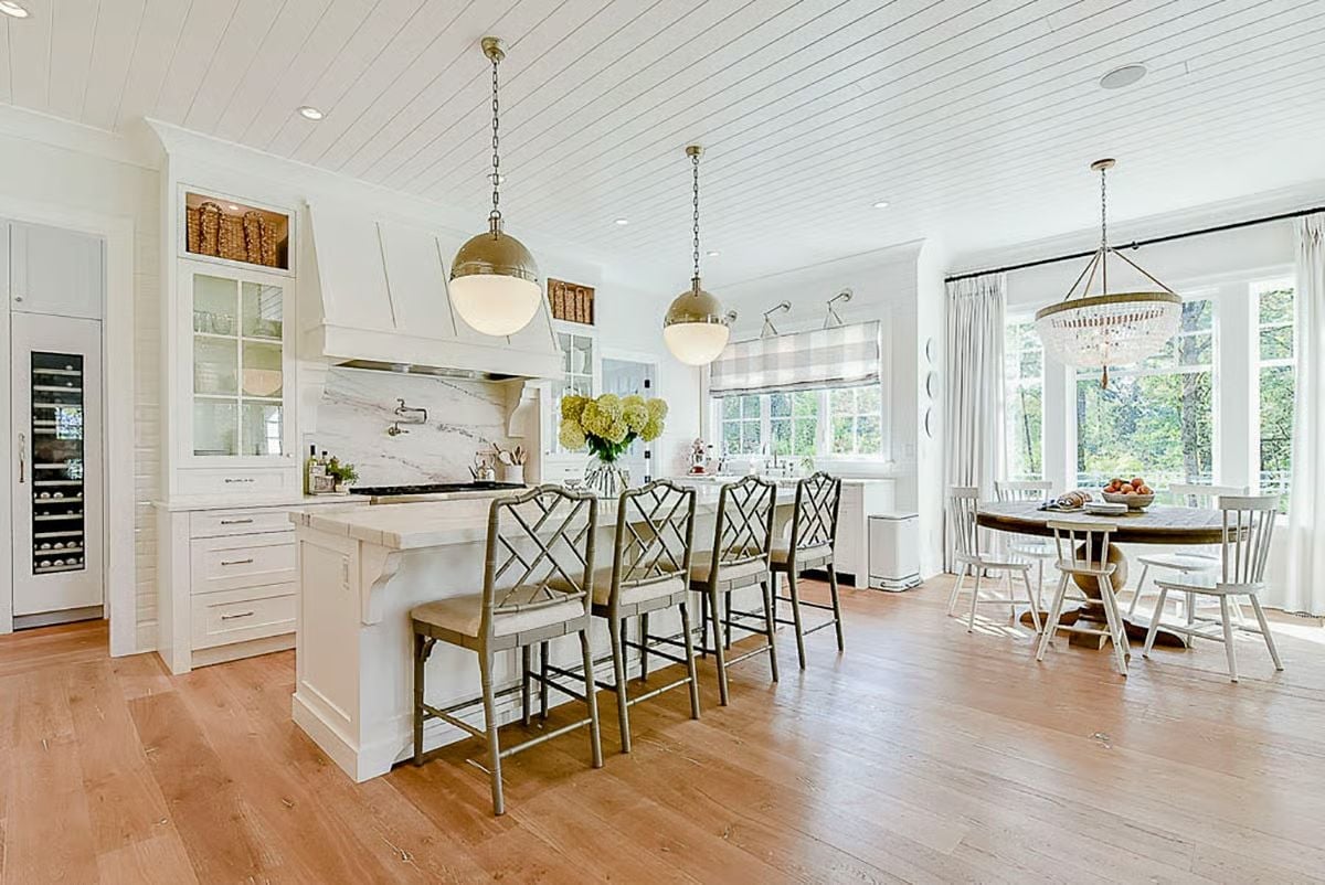 Brass Pendants, Chippendale Barstools, and a Wine Fridge That's Not Hiding Anymore