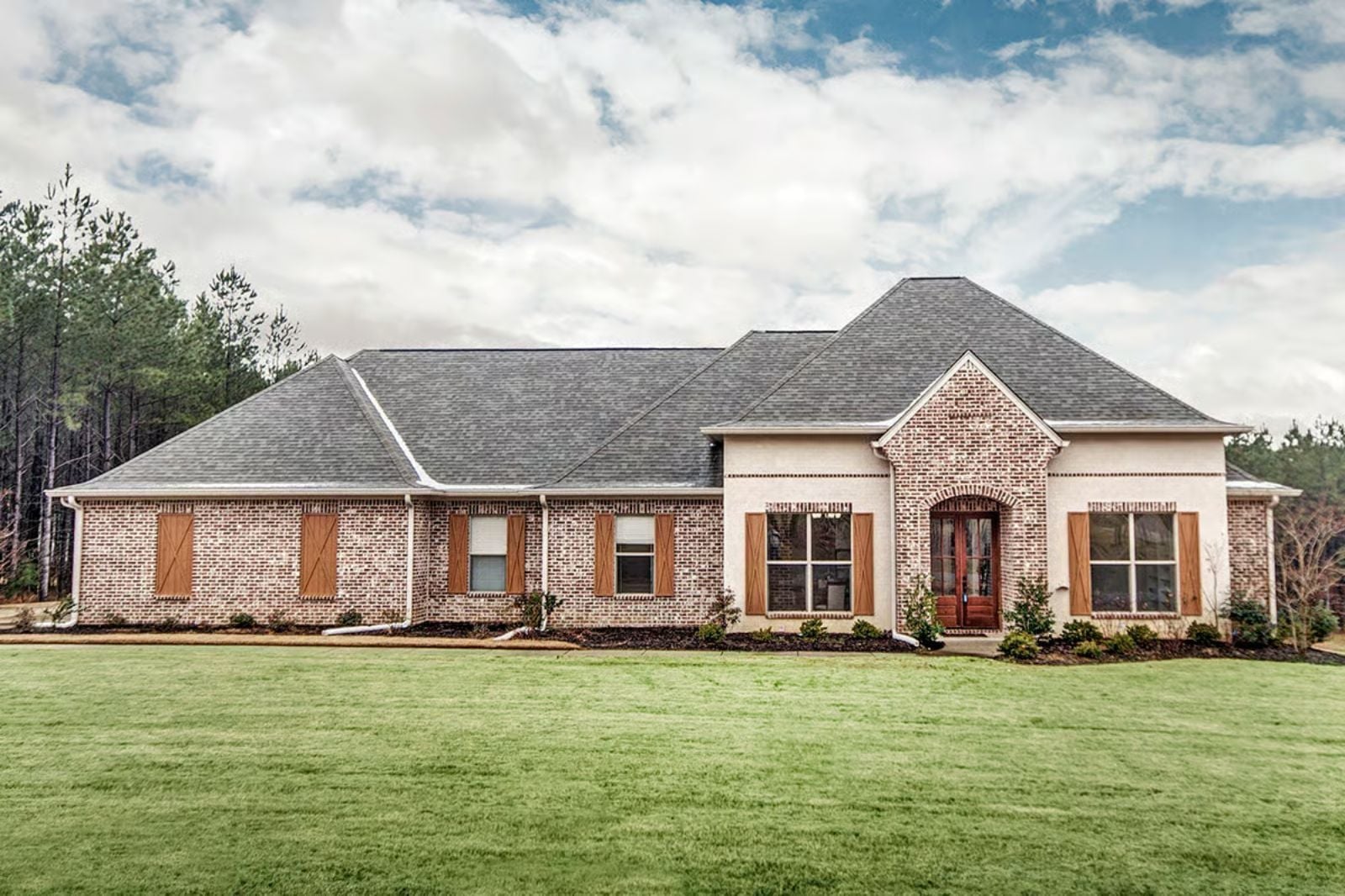 Natchez Brick 4-Bedroom Acadian with Covered Rear Porch Designed for Families Who Make Their House the One Everyone Wants to Visit (Floor Plan)