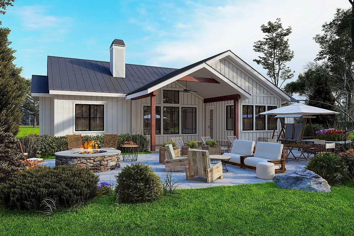 Stone Fire Pit, Navy Metal Roof, and a Patio Built for Staying Put